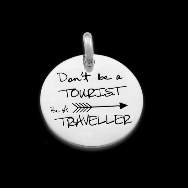 Candid sterling silver 25mm round 'Don’t be a tourist be a traveller'